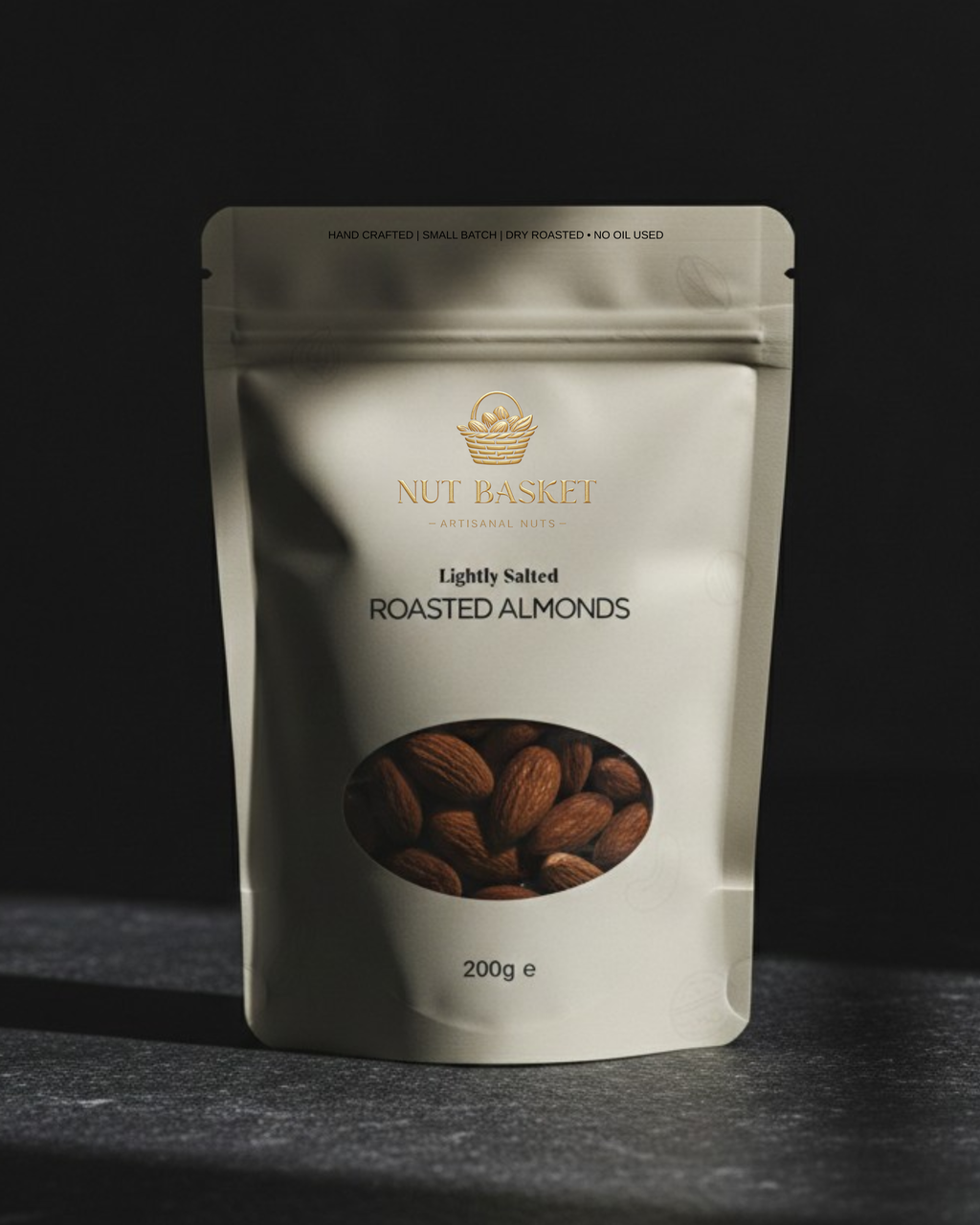 Packaging of Nut Basket roasted almonds on a dark background