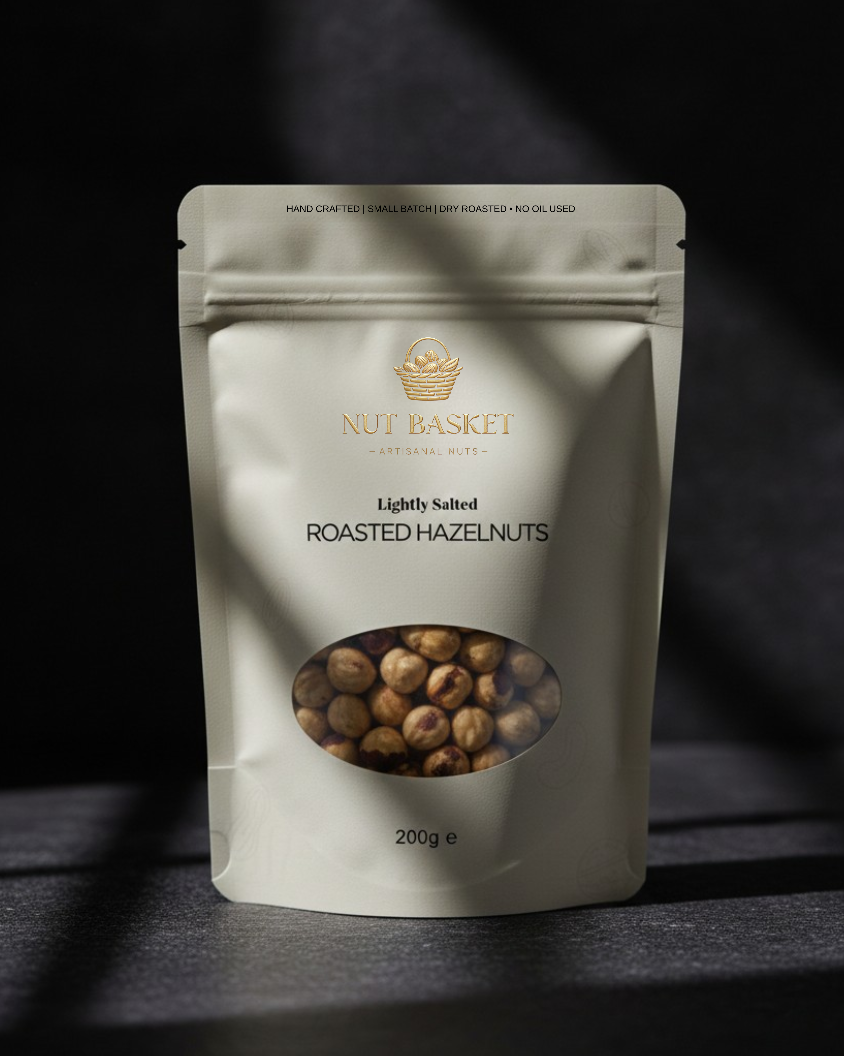 Package of Nut Basket roasted hazelnuts on a dark background