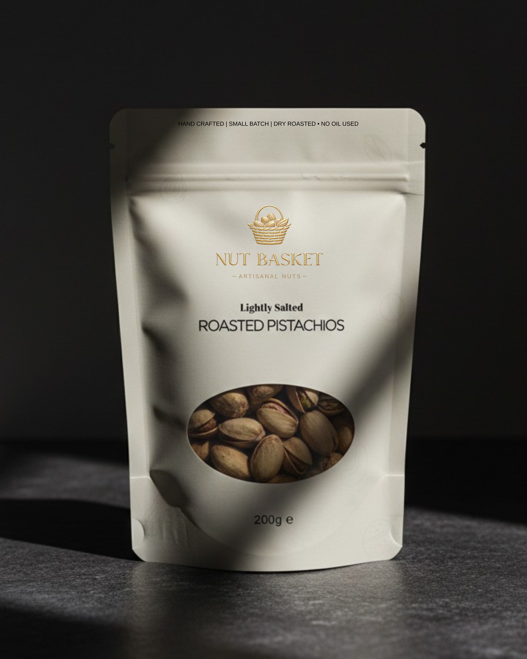 Packaging of Nut Basket roasted pistachios on a dark background
