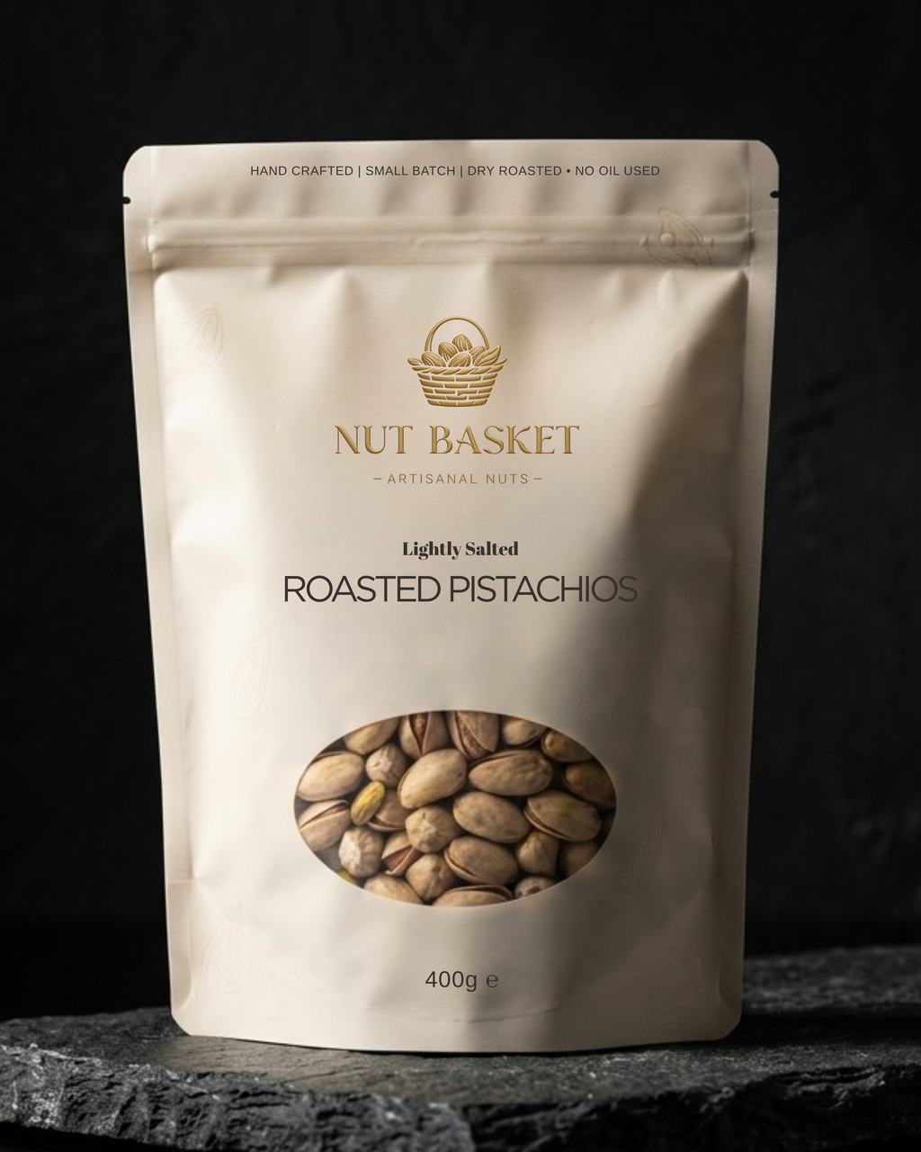 Nut Basket roasted pistachios packaging on a dark background