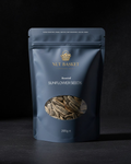 NUT BASKET sunflower seeds packaging on a dark background