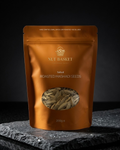 Brown package of Nut Basket Roasted Mashadi Seeds on a dark background